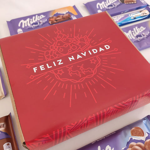 Caja con fajín navideño, rellena de selección chocolates Milka